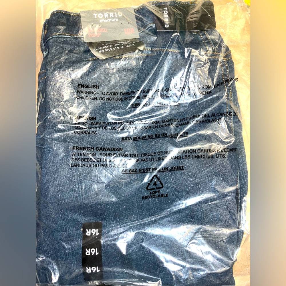 Torrid size 16R dark blue bombshell skinny jeans.
